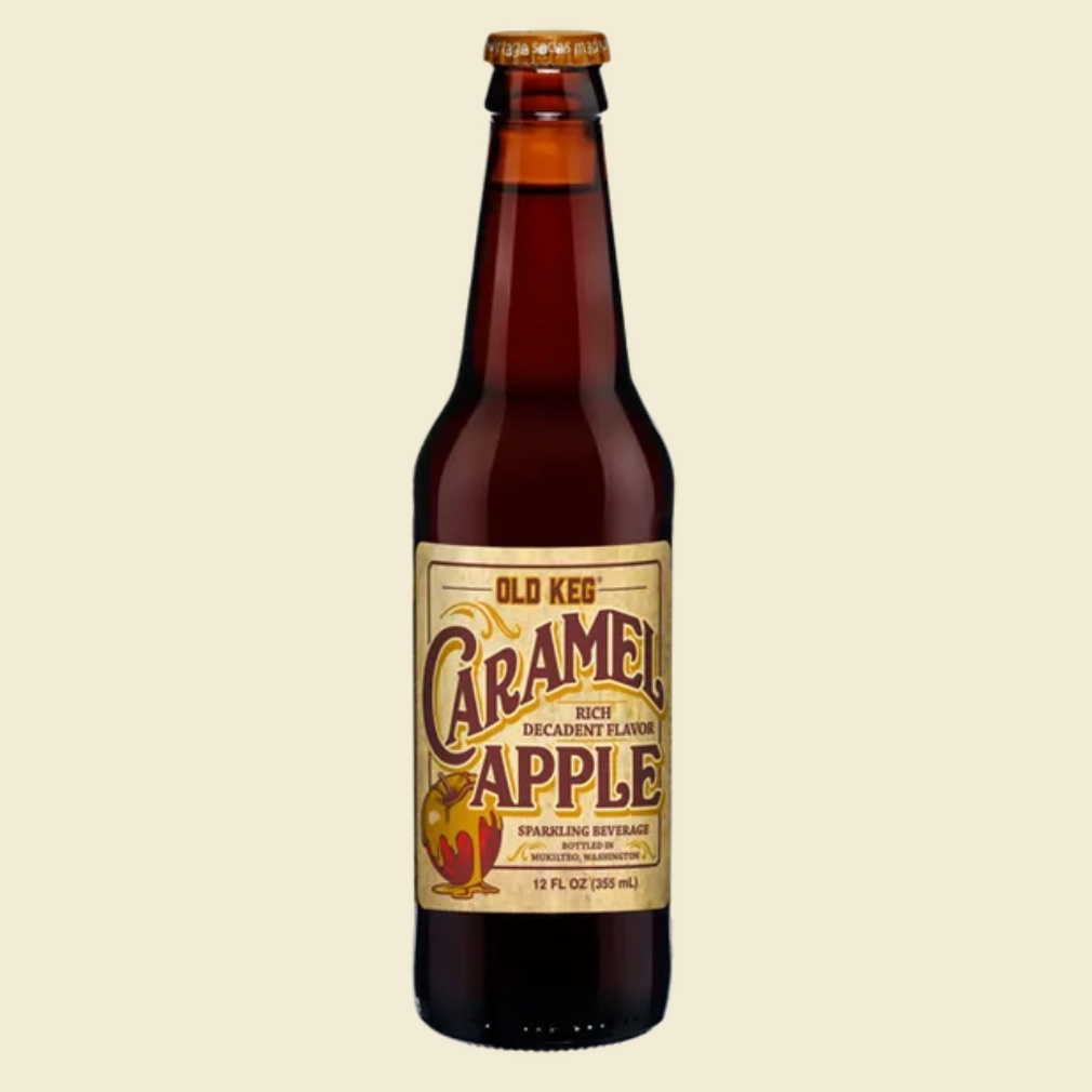 A single bottle of Old Keg Caramel Apple beverage centered on a light beige background, with blue text above reading 'O-So Peach' and partial text below.