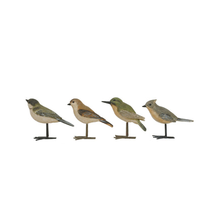 Four bird figurines on a white background