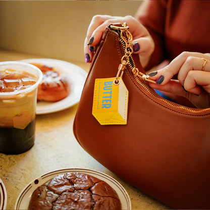 Butter Charmer - Bag Airtag Holder